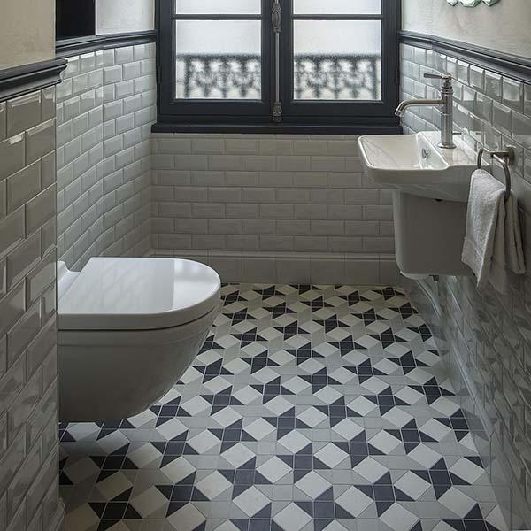 geometric tile floor in bathroom